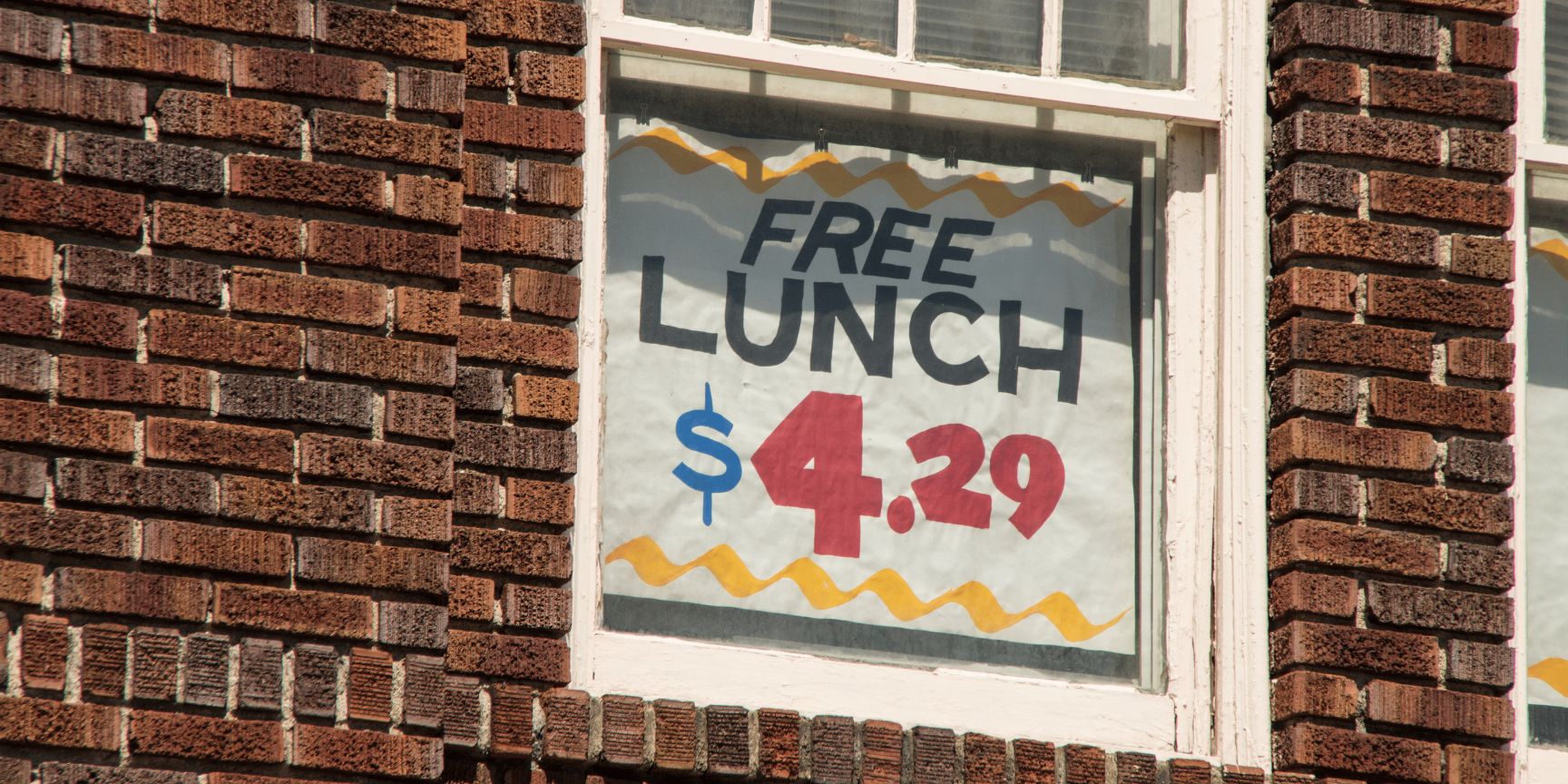 Free Lunch Sign for Four Dollars and Twenty-Nine Cents